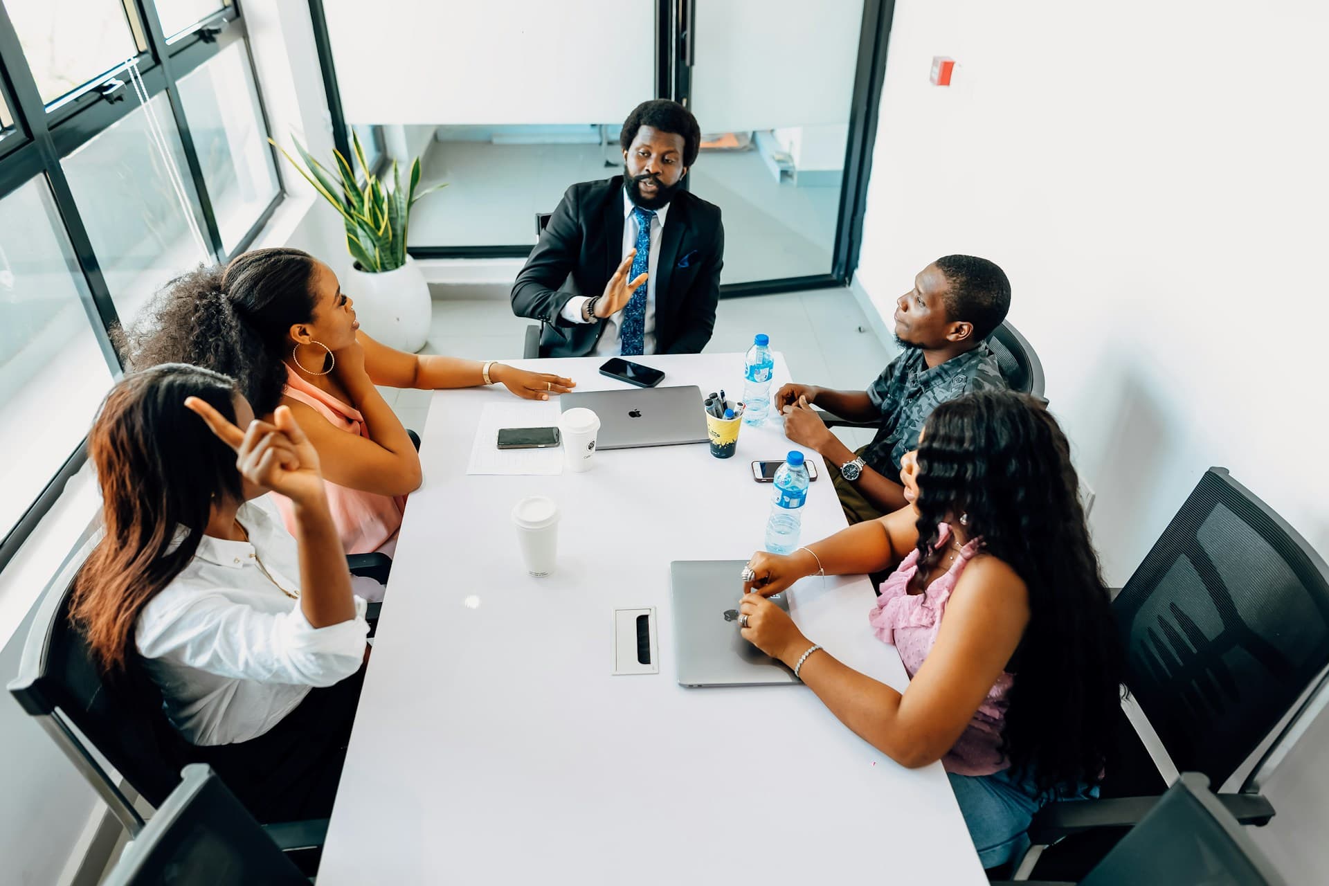 A team reviewing work together at a table